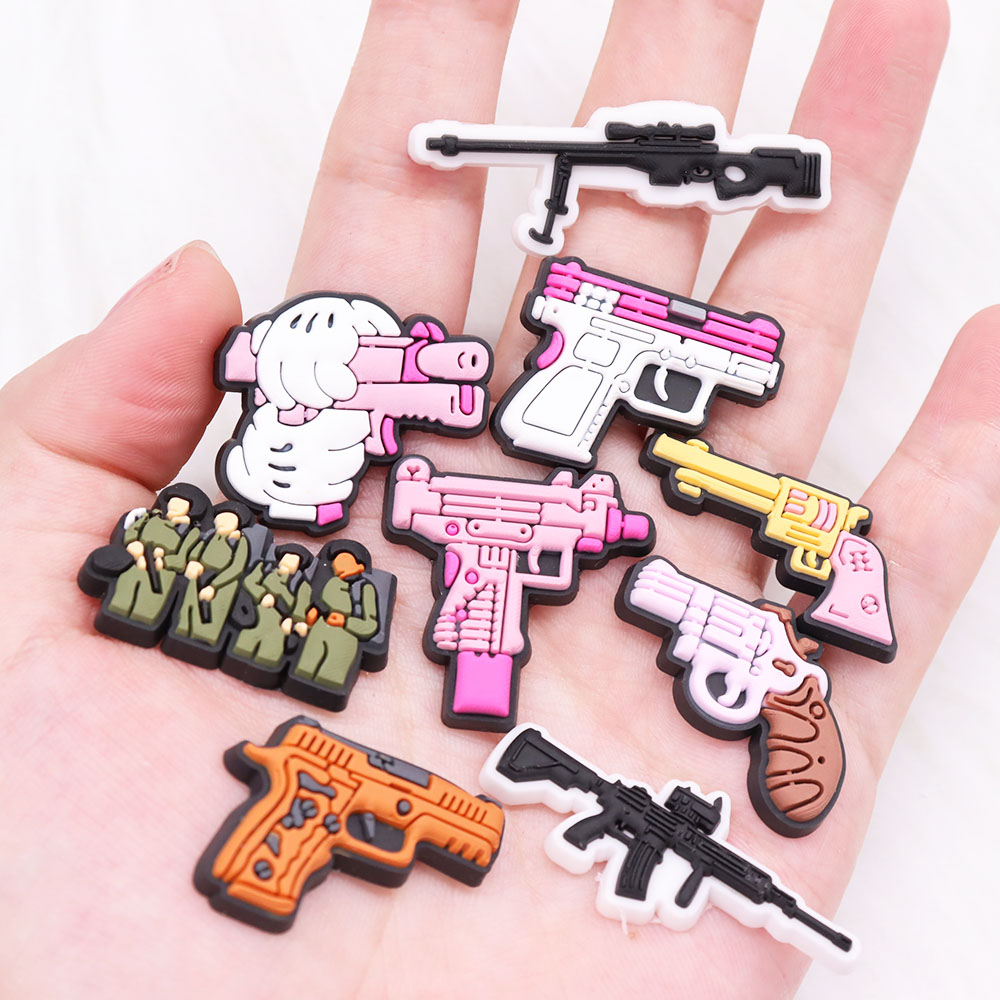 Sales 1pcs Soldier Gun Shoes Accessories Man Garden Sandals Buckle Decorations Fit Croc Jibz Charm Party Gift